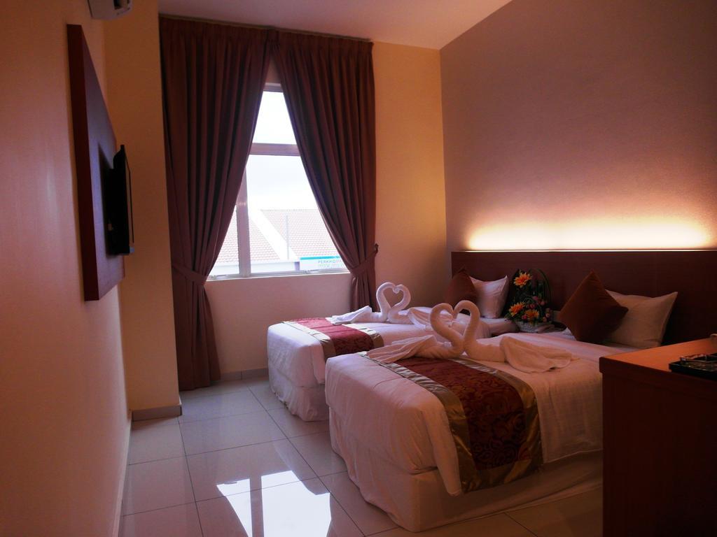 Supreme Hotel Malakka Oda fotoğraf