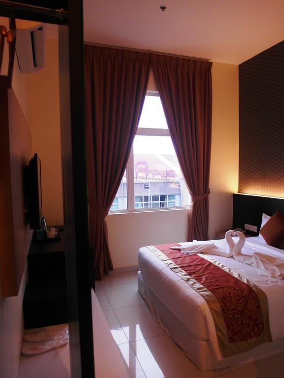 Supreme Hotel Malakka Oda fotoğraf