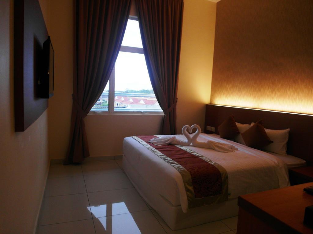 Supreme Hotel Malakka Oda fotoğraf