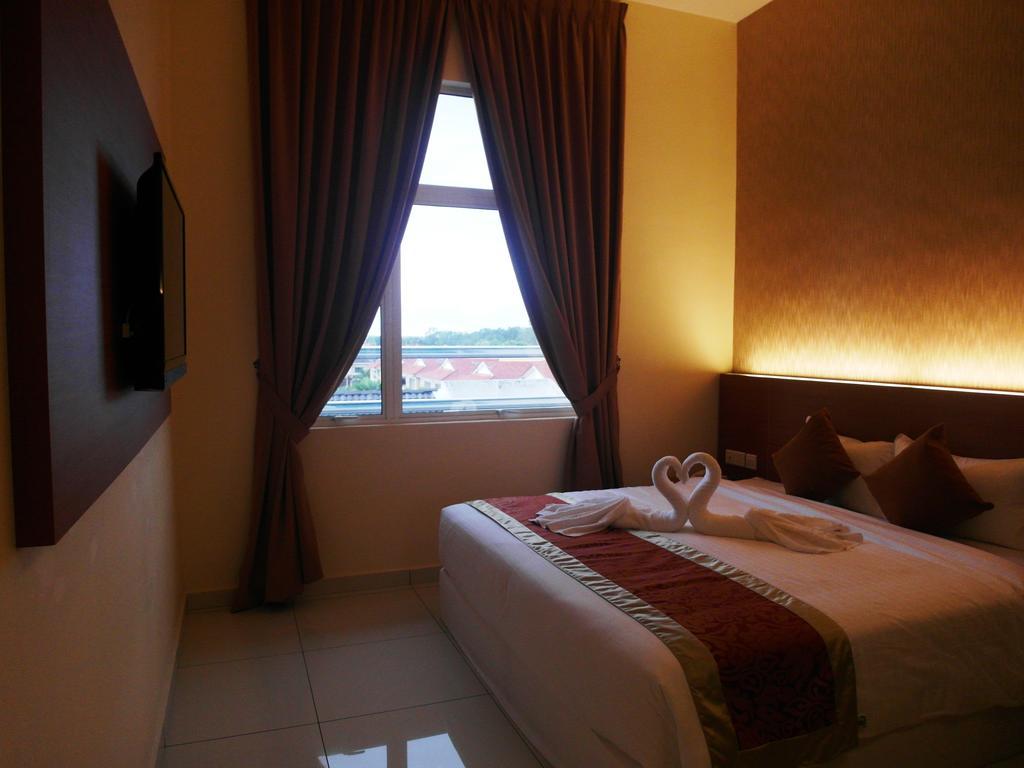 Supreme Hotel Malakka Oda fotoğraf