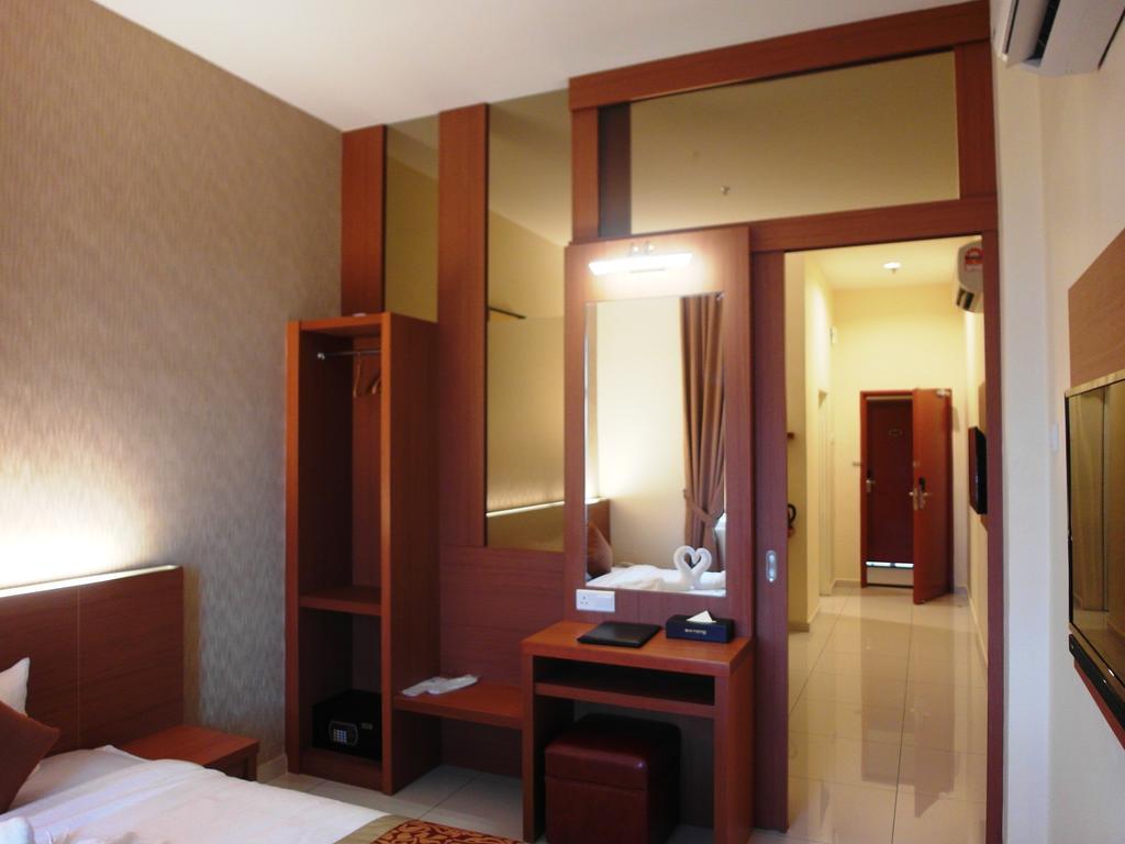 Supreme Hotel Malakka Oda fotoğraf