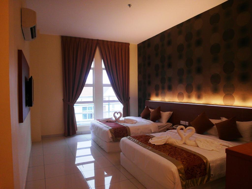 Supreme Hotel Malakka Oda fotoğraf